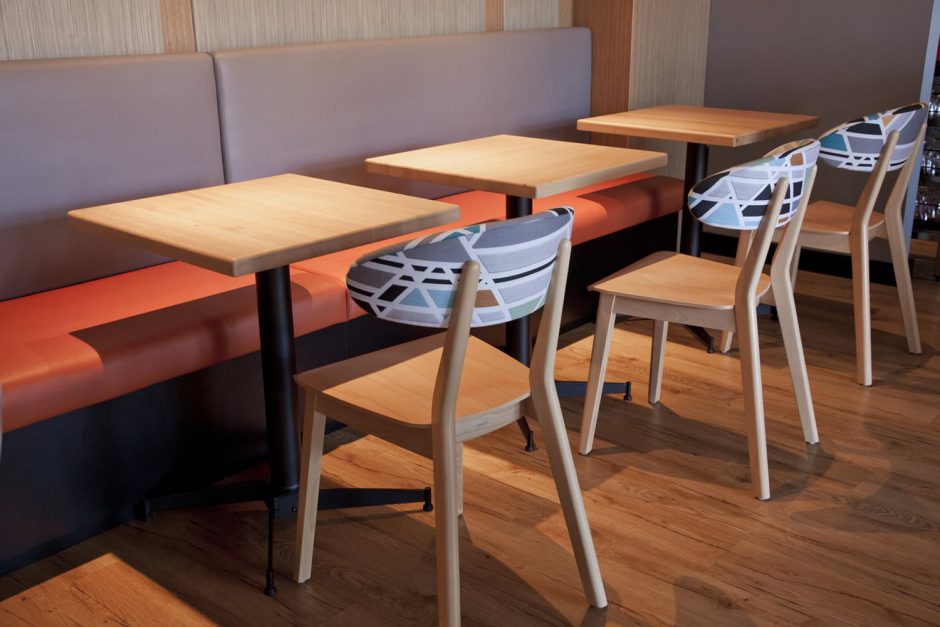 Spritz Spizzicheria - indoor dining featuring NOROCK Parkway self-stabilising table bases