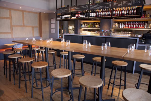 Spritz Spizzicheria - indoor bar featuring NOROCK Parkway self-stabilising bar height table bases