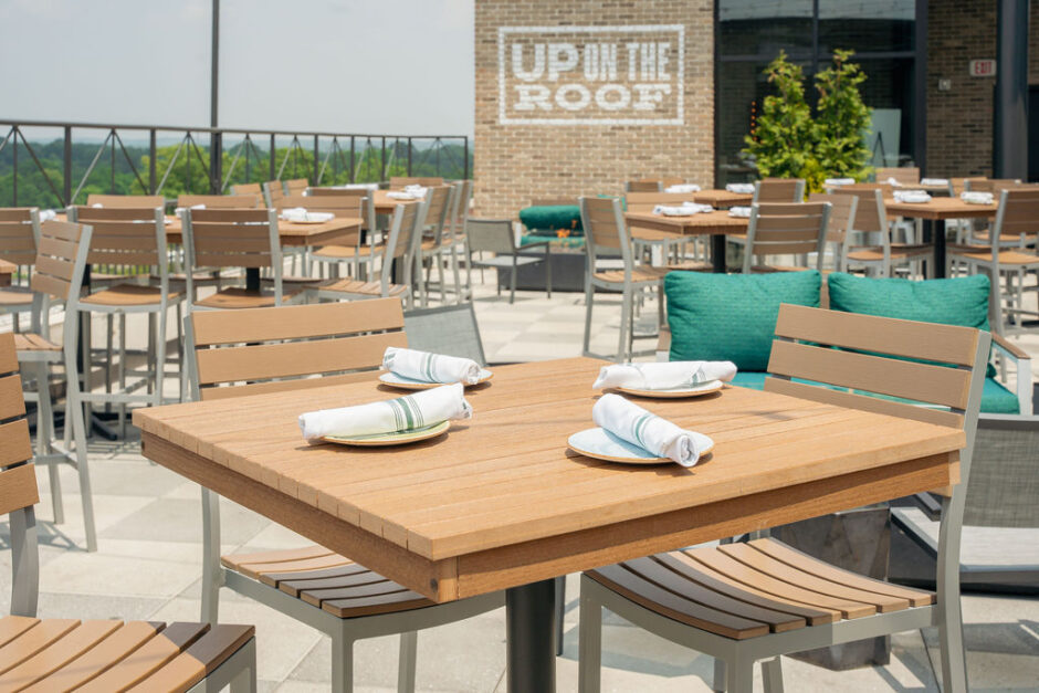 Al fresco dining experience at UP on the Roof, with a focus on quality and ambiance.