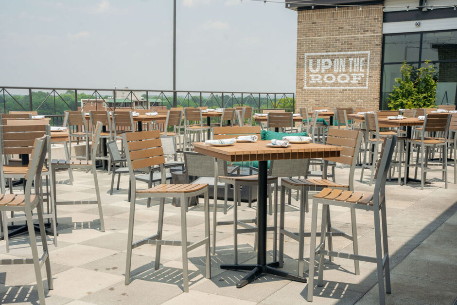 Stylish and comfortable seating options at UP on the Roof, inviting guests to unwind