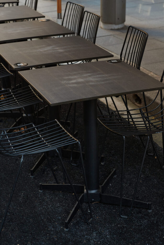 NOROCK's Parkway self-stabilising table base for outdoor dining at Menzies Bar in Sydney Australia