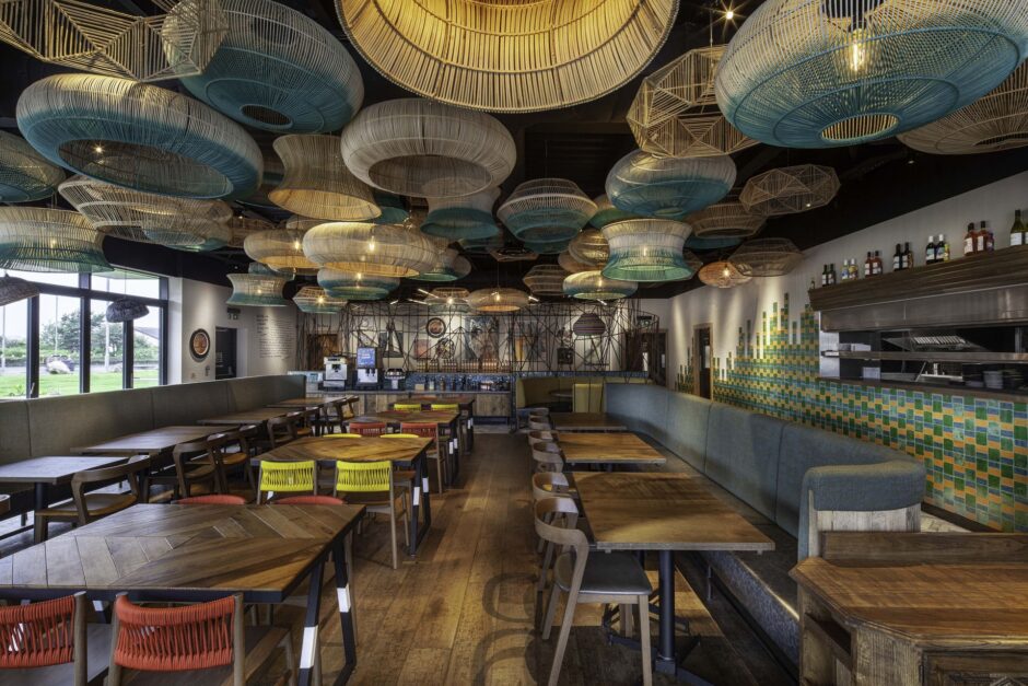 Energetic and vibrant interior design at Nando's Paisley by Harrison