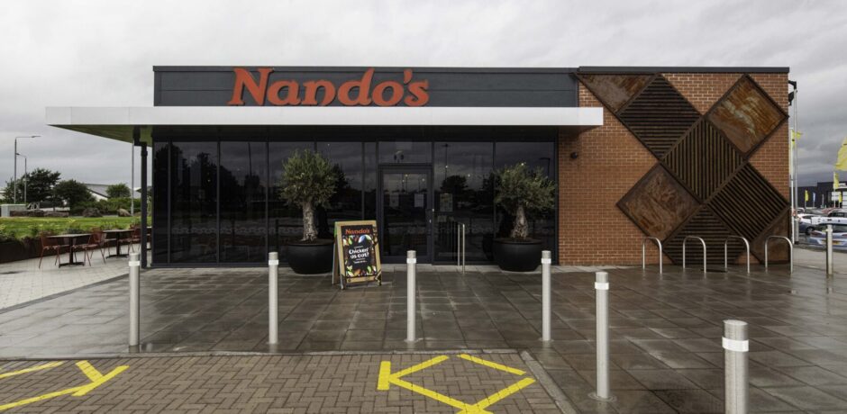 Exterior view of Nando's Paisley, a vibrant and inviting dining destination in the UK
