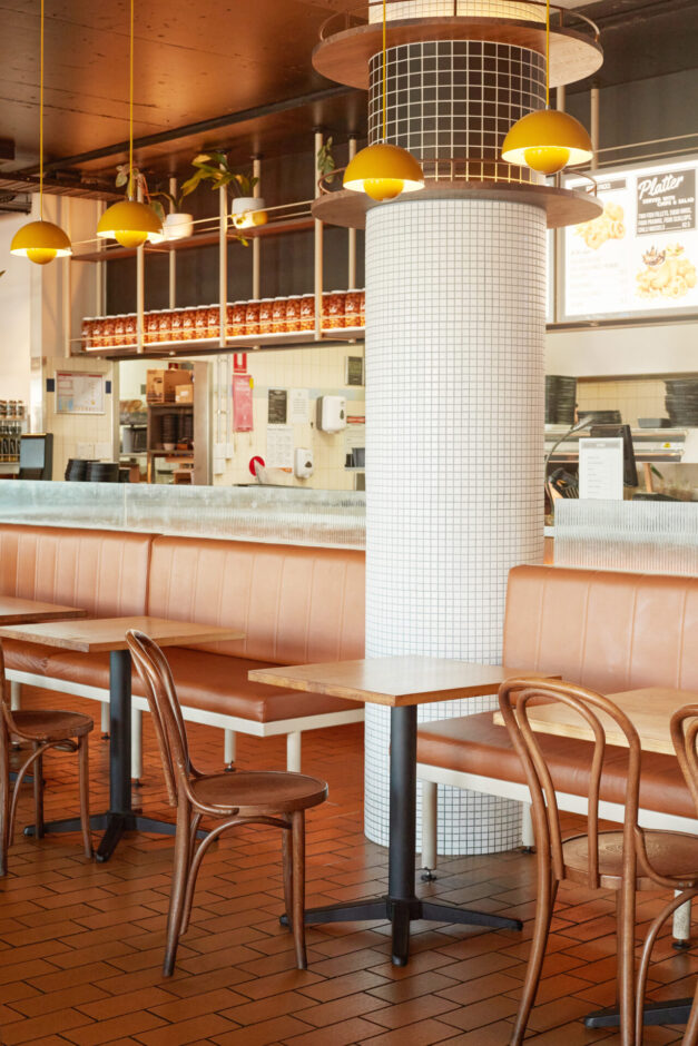 New York Deli meets 80s fish and chip shop design at Kailis Fishmarket Cafe featuring NOROCK Trail self-stabilising table bases