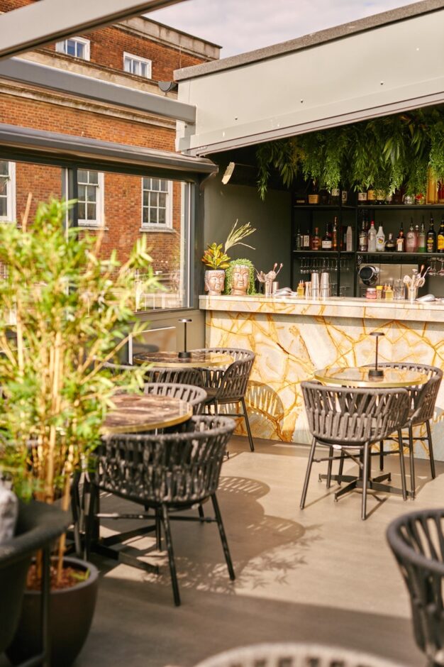 Cognito Lincoln UK with NOROCK Parkway self-stabilising table bases on their Rooftop Terrace