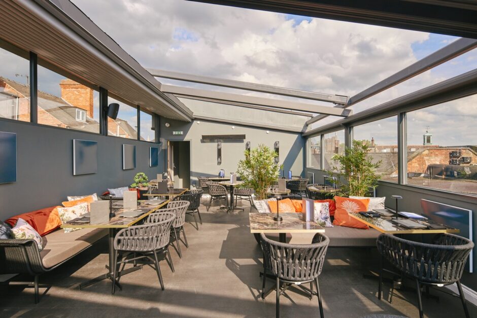 Cognito Lincoln UK with NOROCK Parkway self-stabilising table bases on their Rooftop Terrace